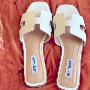 Classiest white Steve Madden sandals/ a form of sturdy slip-ons so called slides